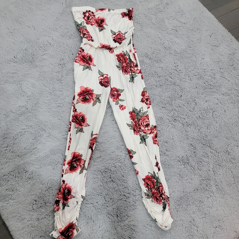 White sleeveless jumpsuit with rose print